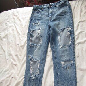 Medium Blue Jeans With Rips